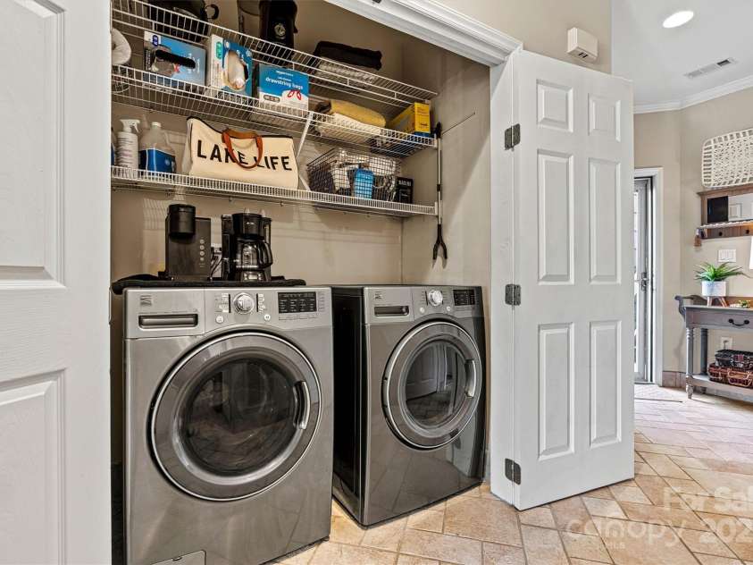 1007 Southwest Drive, Davidson, NC 28036.  MLS# CAR4271868, YatesRealty ID 22720. Laundry closet with storage space