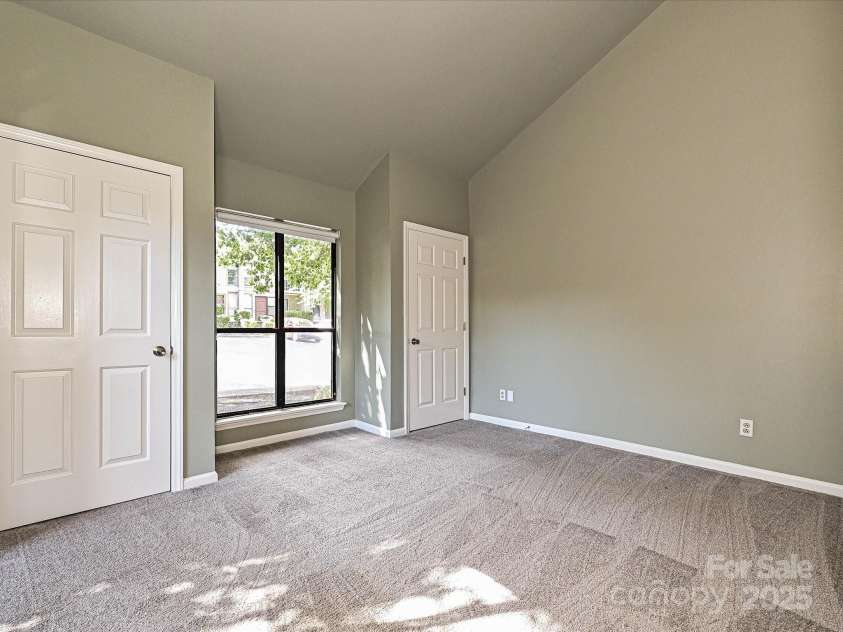 7916 Charter Oak Lane, Charlotte, NC 28226.  MLS# CAR4272766, YatesRealty ID 22722. Downstairs Bedroom