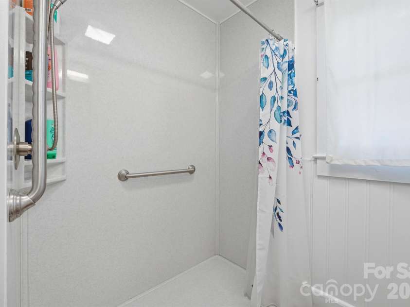 305 9th Street, Newton, NC 28658.  MLS# CAR4372482, YatesRealty ID 22723. Roll in shower. 
