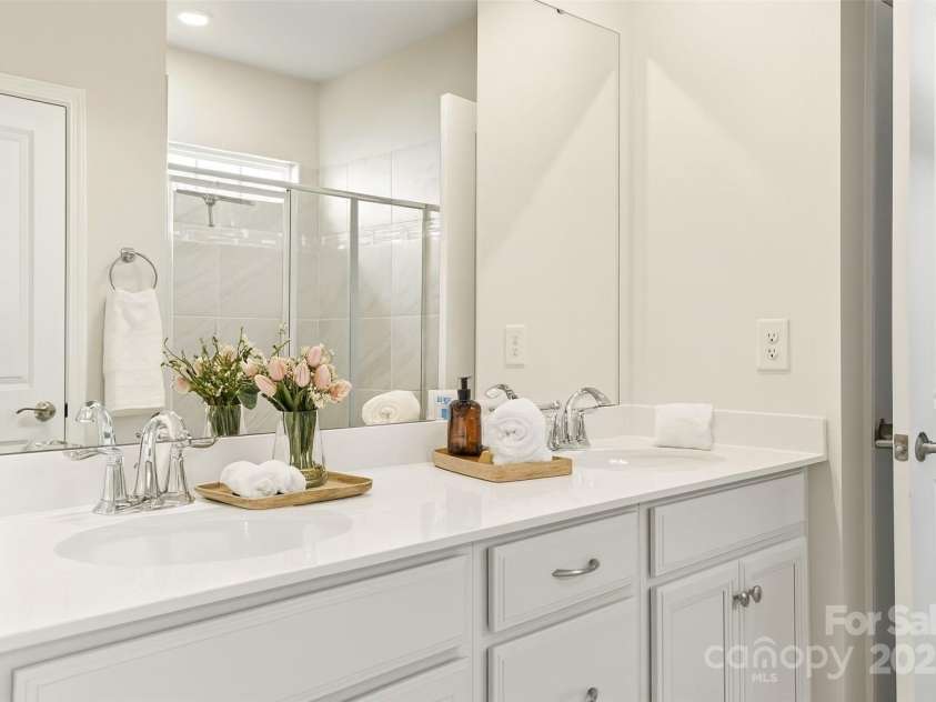 147 Dubois Drive, Mooresville, NC 28115.  MLS# CAR4309004, YatesRealty ID 22724. Double vanities  virtually staged