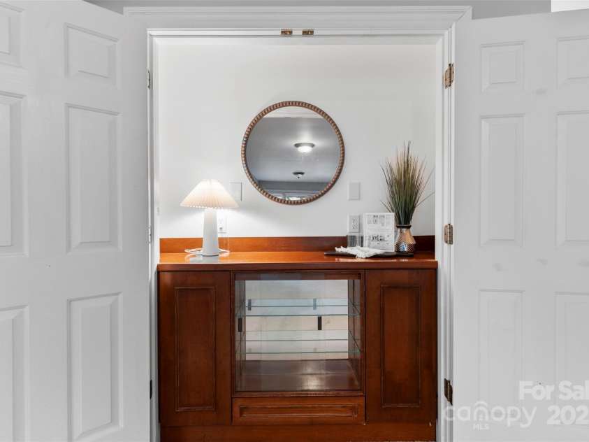 1806 Asbury Hall Court, Charlotte, NC 28209.  MLS# CAR4265884, YatesRealty ID 22727. Bar area in basement for entertaining