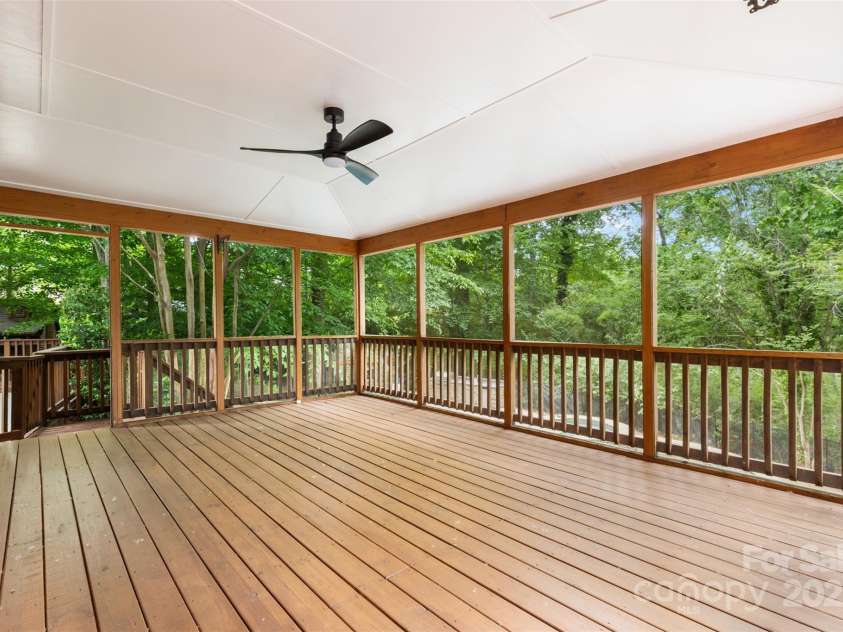 1806 Asbury Hall Court, Charlotte, NC 28209.  MLS# CAR4265884, YatesRealty ID 22727. Enjoy an open deck as well as a screened porch.