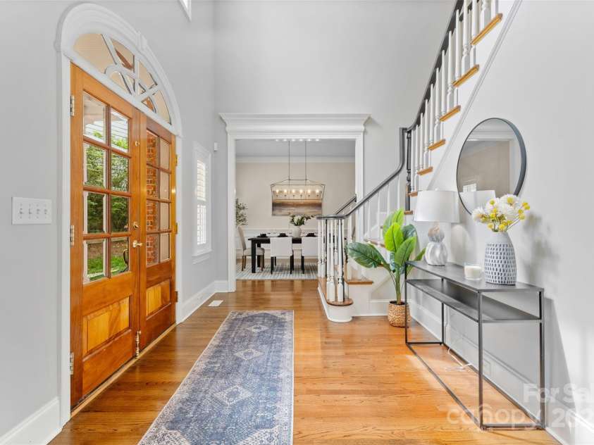 1806 Asbury Hall Court, Charlotte, NC 28209.  MLS# CAR4265884, YatesRealty ID 22727. Foyer filled with natural light (office on right, dining room on left)