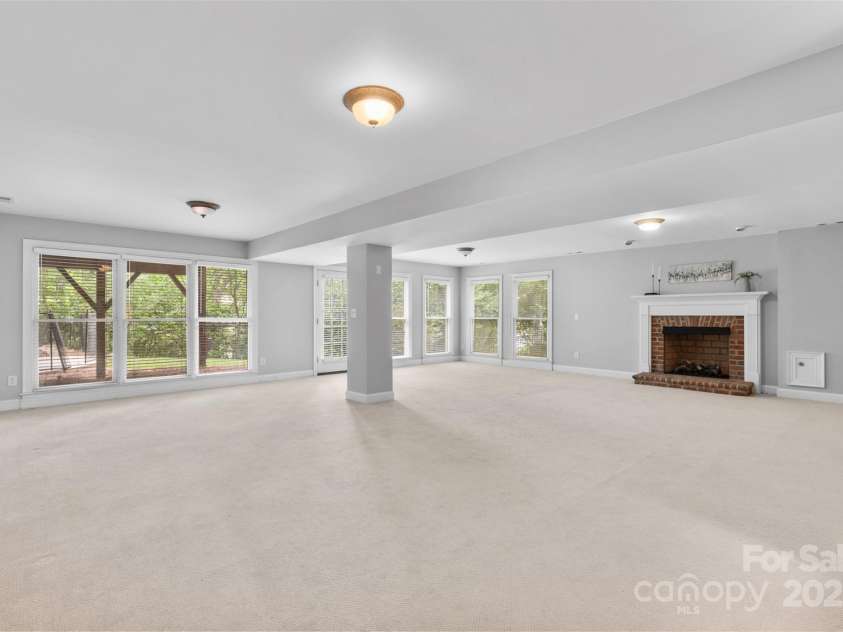 1806 Asbury Hall Court, Charlotte, NC 28209.  MLS# CAR4265884, YatesRealty ID 22727. Huge basement with walkout access to pool