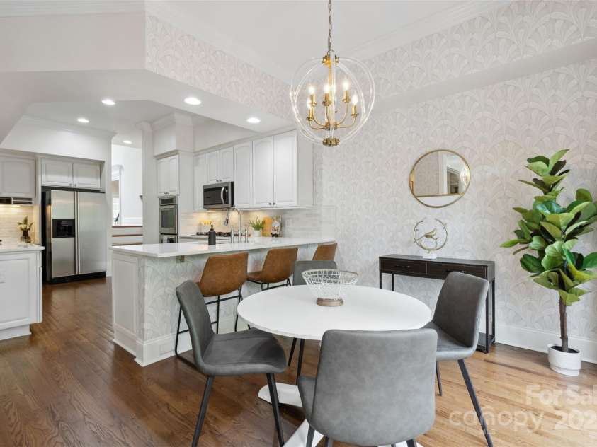 1806 Asbury Hall Court, Charlotte, NC 28209.  MLS# CAR4265884, YatesRealty ID 22727. Kitchen with double islands and eat-in breakfast area