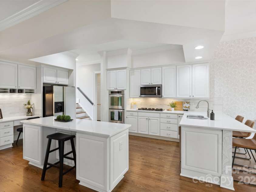 1806 Asbury Hall Court, Charlotte, NC 28209.  MLS# CAR4265884, YatesRealty ID 22727. Kitchen with new quartz countertops and new backsplash