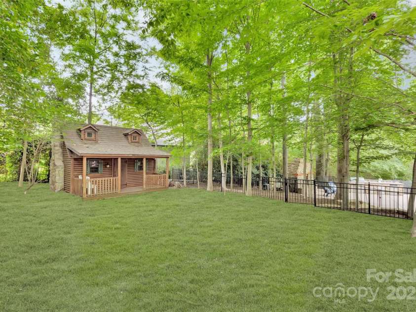 1806 Asbury Hall Court, Charlotte, NC 28209.  MLS# CAR4265884, YatesRealty ID 22727. Side yard is ready to be turfed for a putting green, soccer goal, private garden, or extended entertaining area!