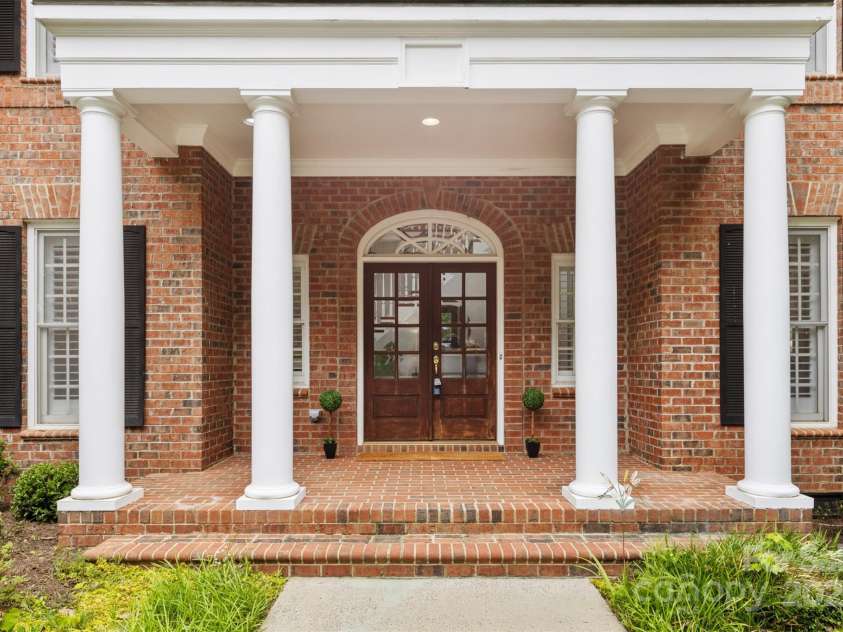 1806 Asbury Hall Court, Charlotte, NC 28209.  MLS# CAR4265884, YatesRealty ID 22727. Your welcoming and grand front entrance.