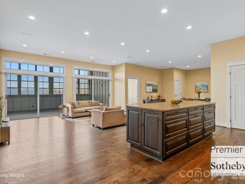 179 Serenity Ridge Trail, Asheville, NC 28804.  MLS# CAR4361567, YatesRealty ID 22729. Basement Kitchen and Living Area. Virtually staged