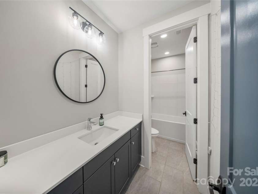 12047 Huntson Reserve Road, Huntersville, NC 28078.  MLS# CAR4301440, YatesRealty ID 2273. Upper Bathroom