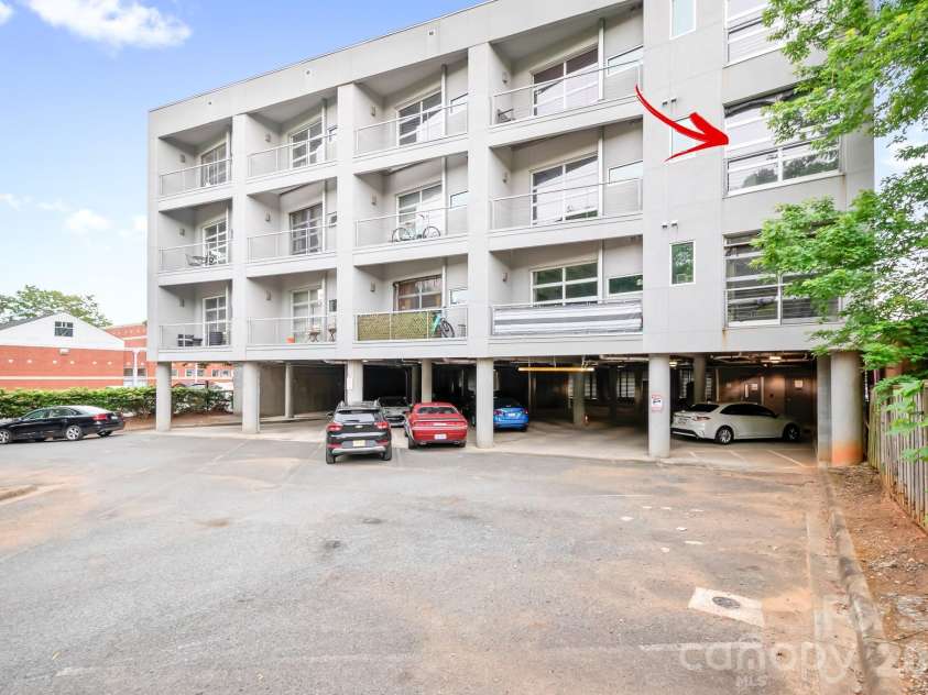 1611 Central Avenue, Charlotte, NC 28205.  MLS# CAR4378247, YatesRealty ID 22730. 3rd Floor Unit on end with Garage Style Window/Door for open air loft feeling.  Positioned on the backside of the building for more quiet enjoyment. Overlooks parking area and homes. Super Cool Garage Door Window for O