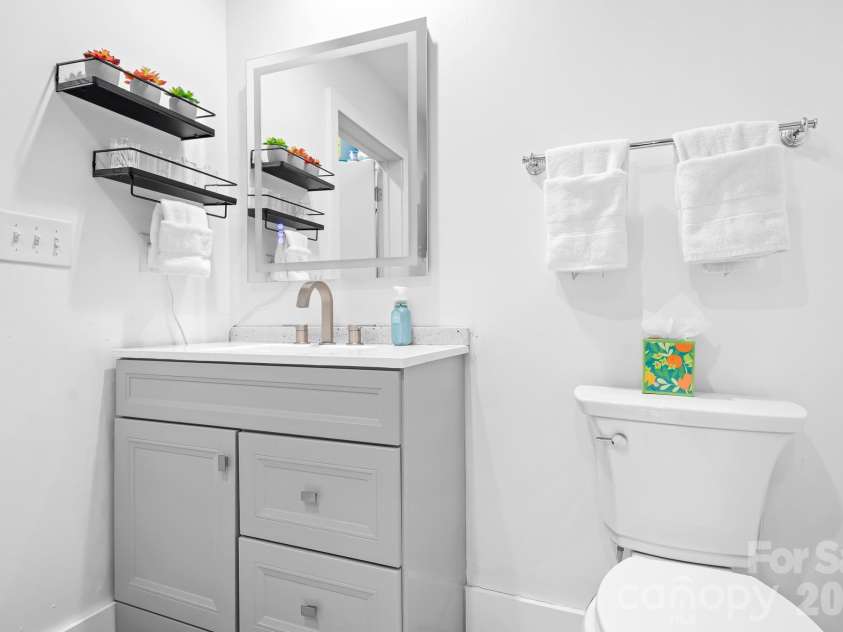 1611 Central Avenue, Charlotte, NC 28205.  MLS# CAR4378247, YatesRealty ID 22730. Bathroom space. Upgraded in 2024.