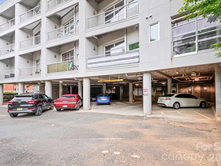 1611 Central Avenue, Charlotte, NC 28205.  MLS# CAR4378247, YatesRealty ID 22730. Modern Building with Covered and Uncovered Parking. 1 permit comes with the unit. Unassigned Parking. ELEVATOR Access unit!