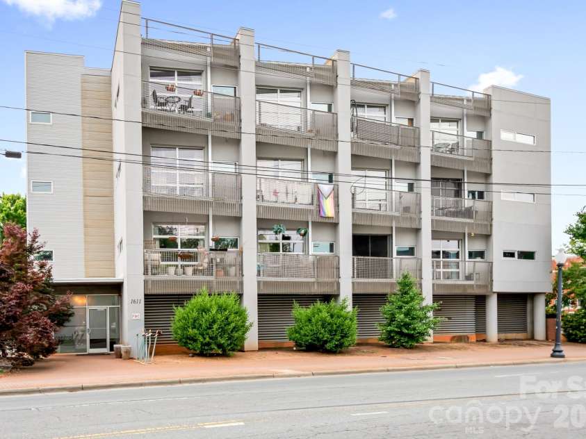1611 Central Avenue, Charlotte, NC 28205.  MLS# CAR4378247, YatesRealty ID 22730. Modern Building with Covered and Uncovered Parking. 1 permit comes with the unit. Unassigned Parking. ELEVATOR Access unit!