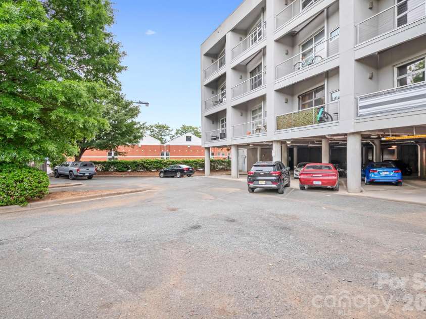 1611 Central Avenue, Charlotte, NC 28205.  MLS# CAR4378247, YatesRealty ID 22730. Modern Building with Covered and Uncovered Parking available. 1 Parking Permit Unassigned spaces. Elevator Access Building!