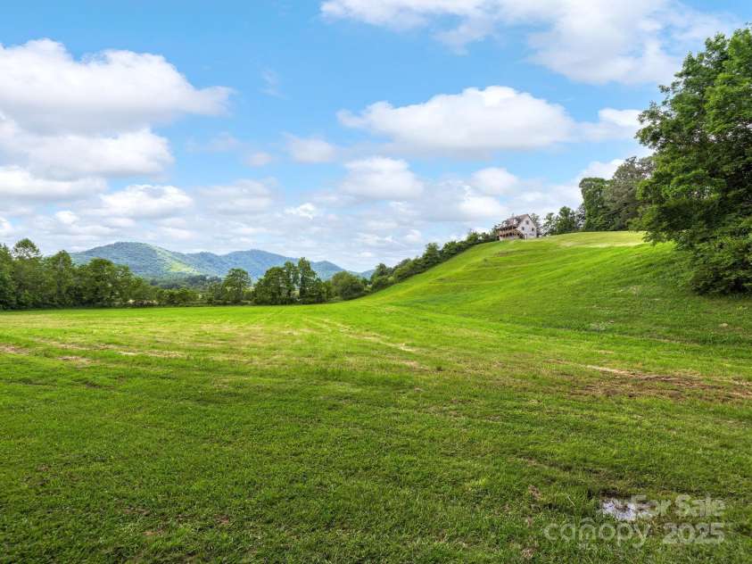 132 Rabbit Ham Road, Leicester, NC 28748.  MLS# CAR4270318, YatesRealty ID 22731. 