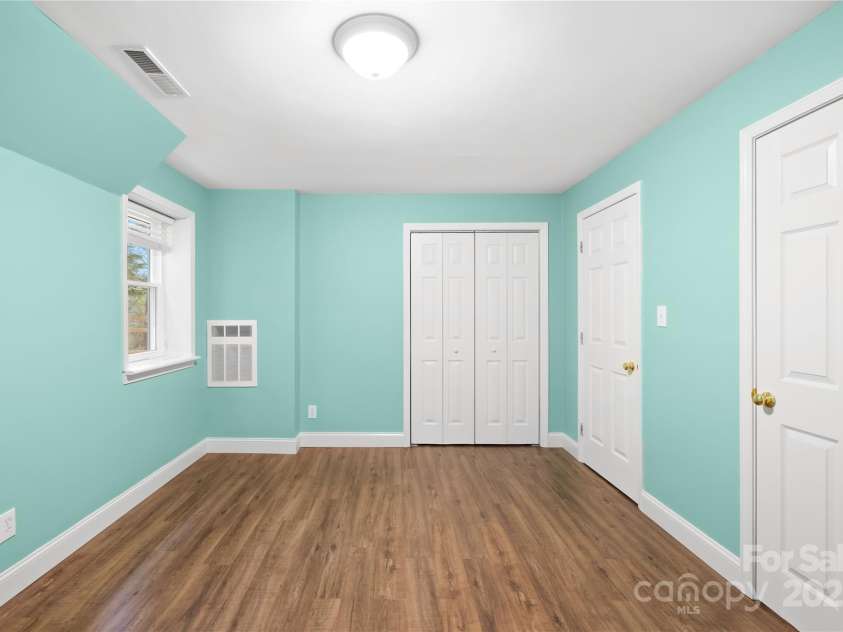 158 Regency Road, Mooresville, NC 28117.  MLS# CAR4242113, YatesRealty ID 22733. 3rd bedroom in basement
