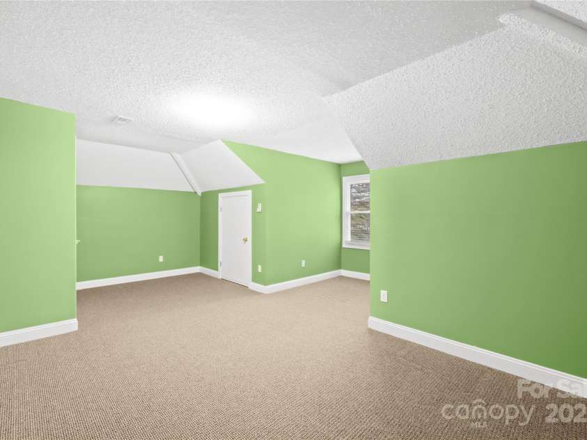 158 Regency Road, Mooresville, NC 28117.  MLS# CAR4242113, YatesRealty ID 22733. Bonus room/2nd bedroom upstairs encircles the staircase and full bathroom