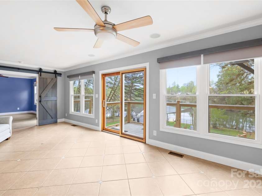 158 Regency Road, Mooresville, NC 28117.  MLS# CAR4242113, YatesRealty ID 22733. Living room/dining room leads to primary bedroom