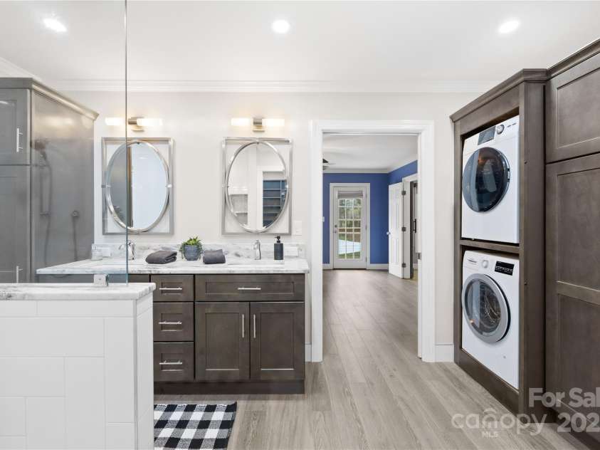 158 Regency Road, Mooresville, NC 28117.  MLS# CAR4242113, YatesRealty ID 22733. Primary Bath has it's own laundry room built in