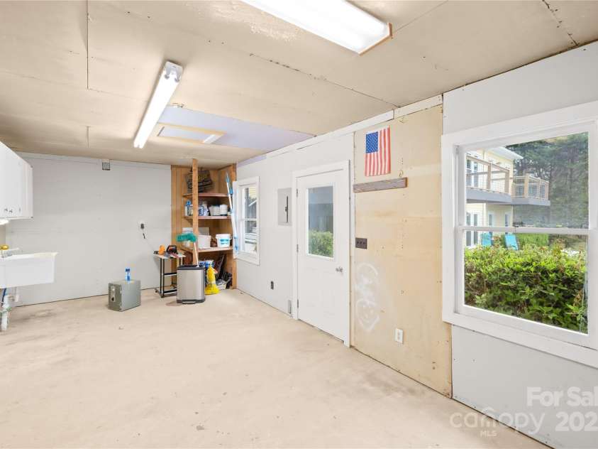 158 Regency Road, Mooresville, NC 28117.  MLS# CAR4242113, YatesRealty ID 22733. Small 12x24 shop just off the patio has electric and plumbing