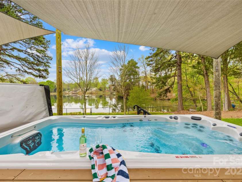 158 Regency Road, Mooresville, NC 28117.  MLS# CAR4242113, YatesRealty ID 22733. Swimspa or 'Spool' a spa and pool combo that will convey