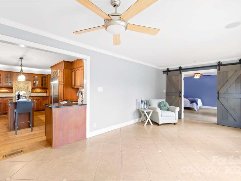 158 Regency Road, Mooresville, NC 28117.  MLS# CAR4242113, YatesRealty ID 22733. Use this space however you like; large dining room, sunroom or living room