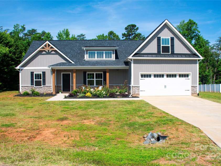 205 Spring Creek Drive, Mount Holly, NC 28120.  MLS# CAR4272747, YatesRealty ID 22737. 