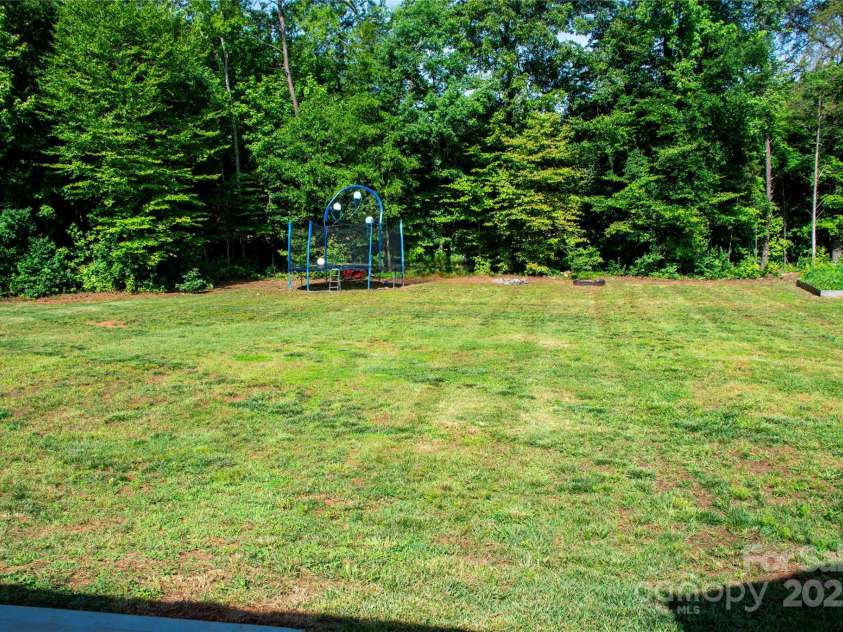 205 Spring Creek Drive, Mount Holly, NC 28120.  MLS# CAR4272747, YatesRealty ID 22737. 