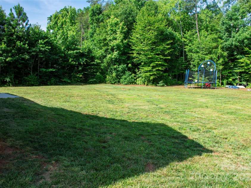 205 Spring Creek Drive, Mount Holly, NC 28120.  MLS# CAR4272747, YatesRealty ID 22737. 