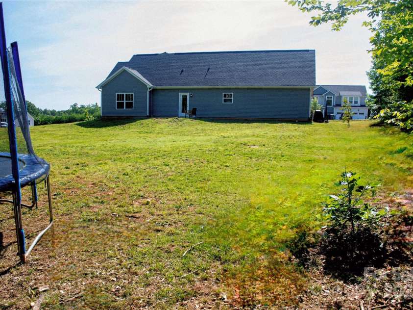 205 Spring Creek Drive, Mount Holly, NC 28120.  MLS# CAR4272747, YatesRealty ID 22737. 