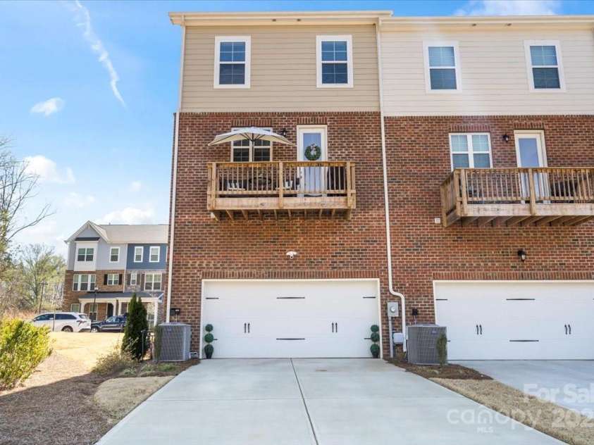15018 Camus Court, Charlotte, NC 28227.  MLS# CAR4239703, YatesRealty ID 22741. End Unit Garage Entrance