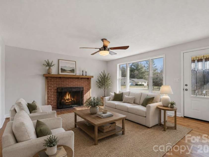 68 Lisam Way, Etowah, NC 28729.  MLS# CAR4324648, YatesRealty ID 22741. Virtually staged living room