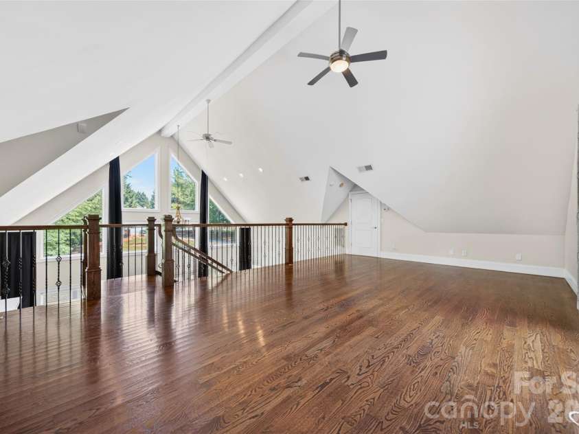 2977 Cabin Creek Drive, Catawba, NC 28609.  MLS# CAR4381953, YatesRealty ID 22742. Huge upper loft features natural light and custom metal spindles