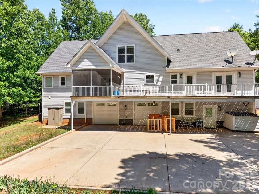 2977 Cabin Creek Drive, Catawba, NC 28609.  MLS# CAR4381953, YatesRealty ID 22742. Massive concrete parking/entertaining area in rear of home