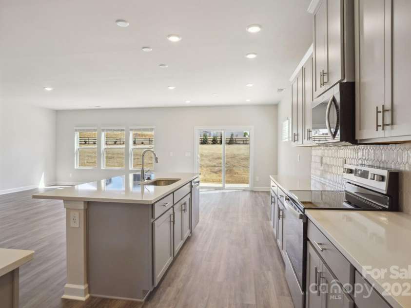 116 Obadiah Court, Mooresville, NC 28115.  MLS# CAR4259441, YatesRealty ID 22746. Photo is not of the actual home, but is an inspirational photo of builder’s model home and may depict options, furnishings, and/or decorator features that are not included