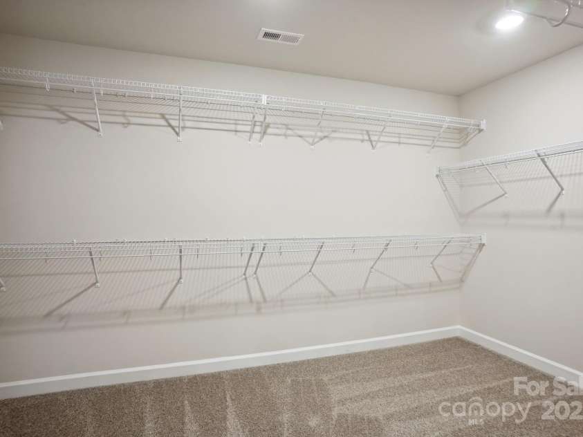 116 Obadiah Court, Mooresville, NC 28115.  MLS# CAR4259441, YatesRealty ID 22746. Photo is not of the actual home, but is an inspirational photo of builder’s model home and may depict options, furnishings, and/or decorator features that are not included