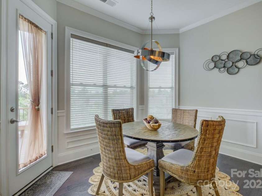 14503 Crest Court, Charlotte, NC 28278.  MLS# CAR4258571, YatesRealty ID 22747. Breakfast area by the kitchen with access to the deck