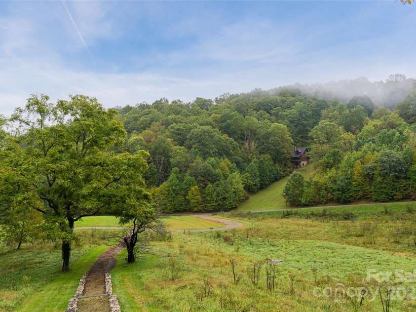 635 Whisper Mountain Drive, Leicester, NC 28748.  MLS# CAR4302796, YatesRealty ID 2275. 