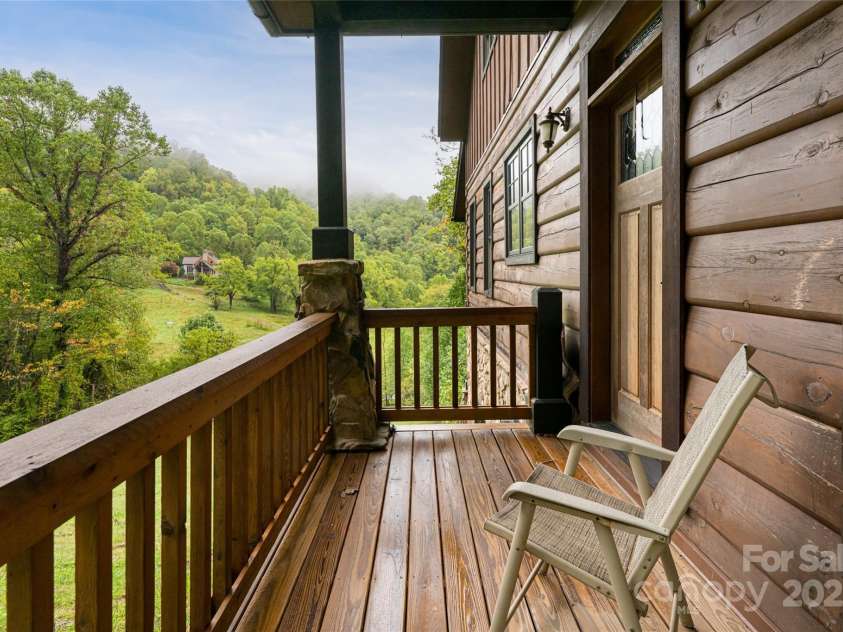 635 Whisper Mountain Drive, Leicester, NC 28748.  MLS# CAR4302796, YatesRealty ID 2275. 