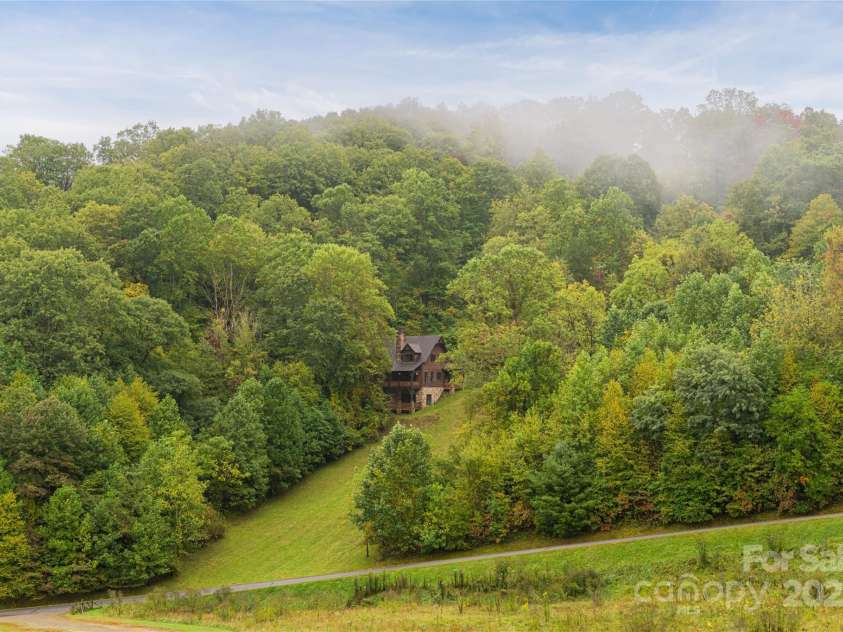 635 Whisper Mountain Drive, Leicester, NC 28748.  MLS# CAR4302796, YatesRealty ID 2275. 