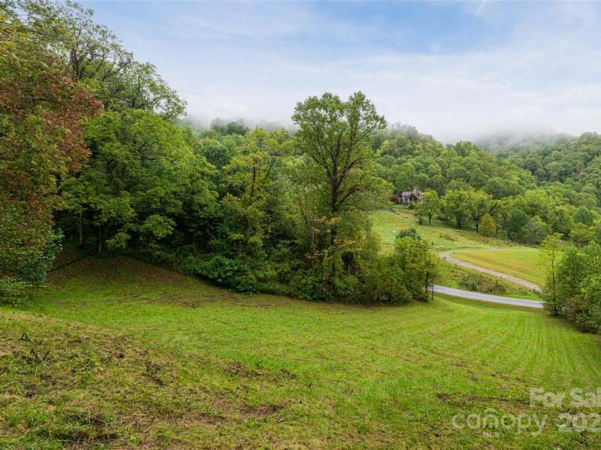 635 Whisper Mountain Drive, Leicester, NC 28748.  MLS# CAR4302796, YatesRealty ID 2275. 