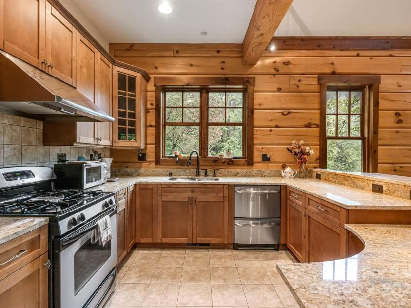 635 Whisper Mountain Drive, Leicester, NC 28748.  MLS# CAR4302796, YatesRealty ID 2275. 