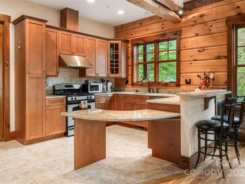 635 Whisper Mountain Drive, Leicester, NC 28748.  MLS# CAR4302796, YatesRealty ID 2275. Elegant and inviting kitchen 