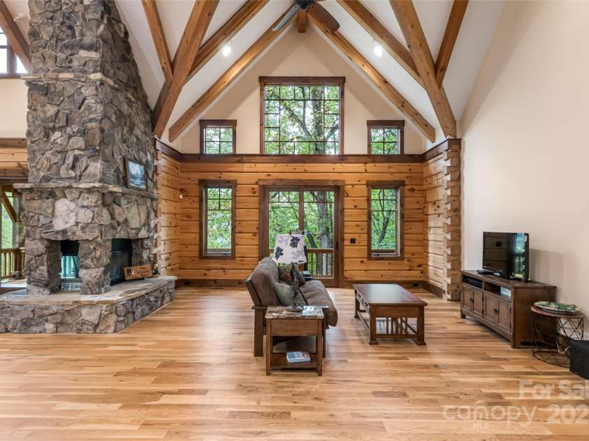 635 Whisper Mountain Drive, Leicester, NC 28748.  MLS# CAR4302796, YatesRealty ID 2275. Top-tier craftsmanship: exposed beams, vaulted ceilings, rich natural textures