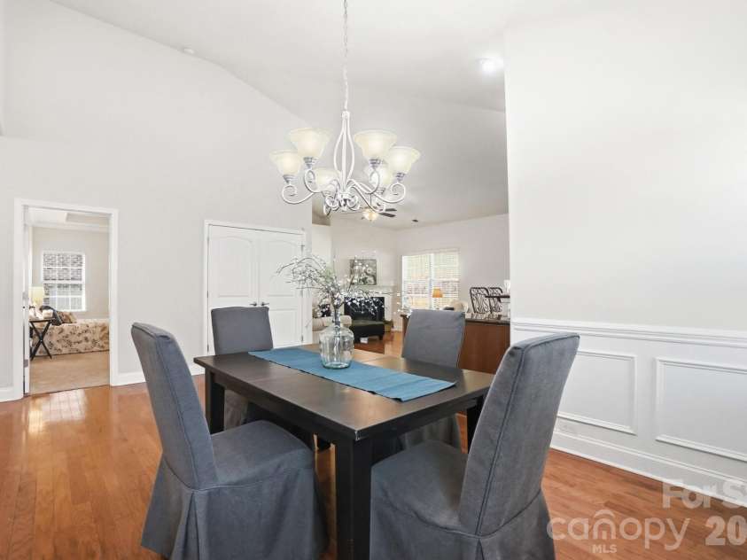 6144 Silver Chime Way, Huntersville, NC 28078.  MLS# CAR4379703, YatesRealty ID 22751. Dining with Wainscotting