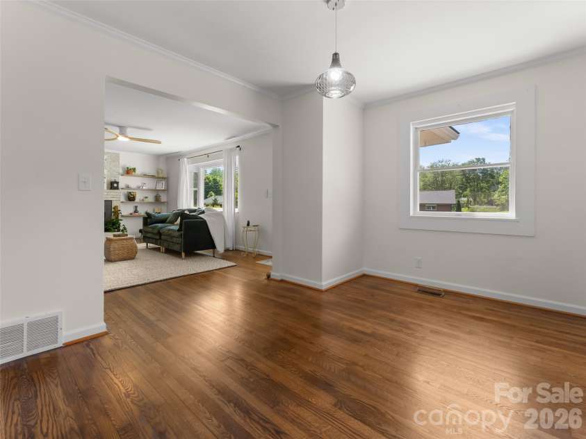 97 Allison Road, Brevard, NC 28712.  MLS# CAR4333314, YatesRealty ID 22753. Dining room