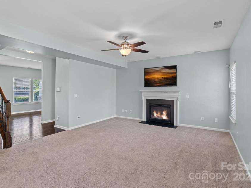 321 Almora Loop, Mooresville, NC 28115.  MLS# CAR4269481, YatesRealty ID 22755. Large family room with in-ceiling speakers
