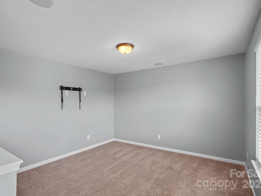 321 Almora Loop, Mooresville, NC 28115.  MLS# CAR4269481, YatesRealty ID 22755. Nice loft area upstairs with wireless speakers - could be entertainment area or office space