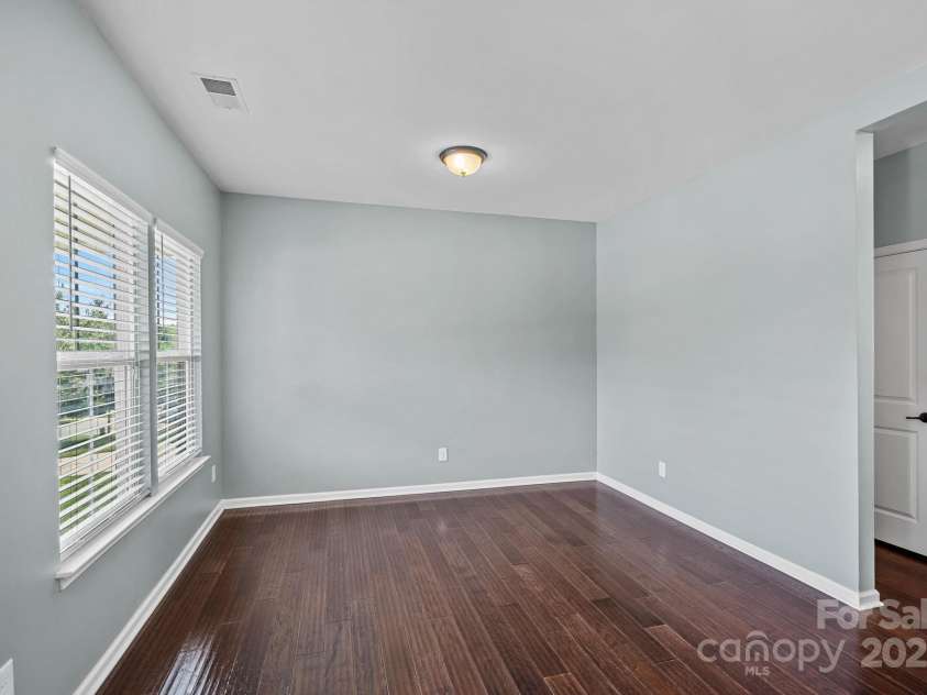 321 Almora Loop, Mooresville, NC 28115.  MLS# CAR4269481, YatesRealty ID 22755. Seller used this space as an office but could also be a cozy living area